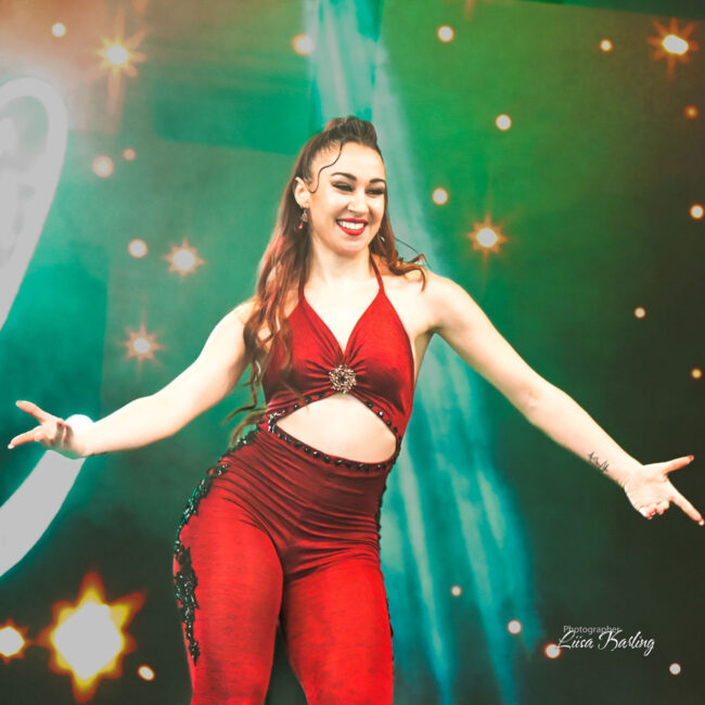 Bachata dancer performing in a competition.